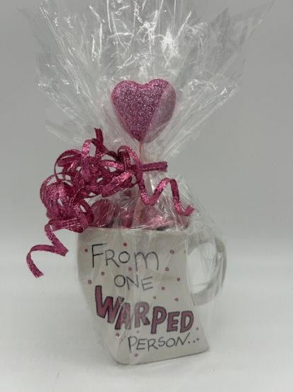 Warped Coffee Mug with Hershey Kisses.